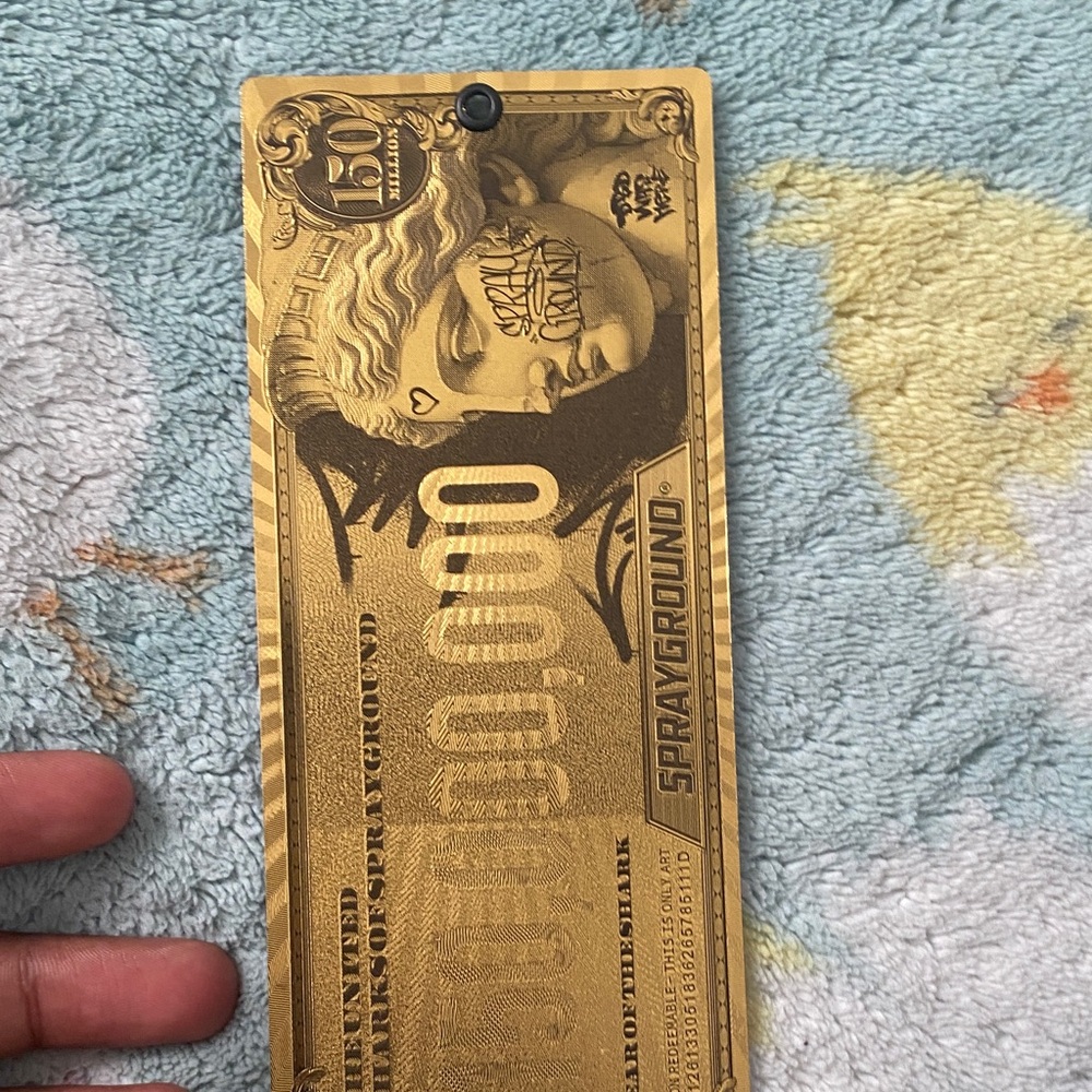 Sprayground Gold Artistic Tag